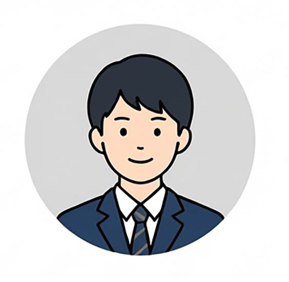 志望校に合格し、笑顔を見せる男子学生